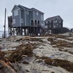 Coastal Flood Warning remains in effect through Tuesday evening