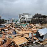 After five homes fall in Buxton, cleanup push continues despite federal government shutdown